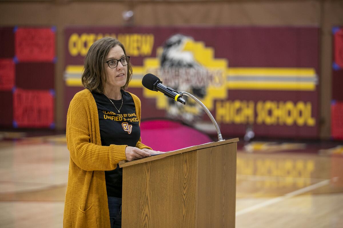 Courtney Gillett, a teacher at Ocean View High School, speaks during an assembly on Nov. 16.
