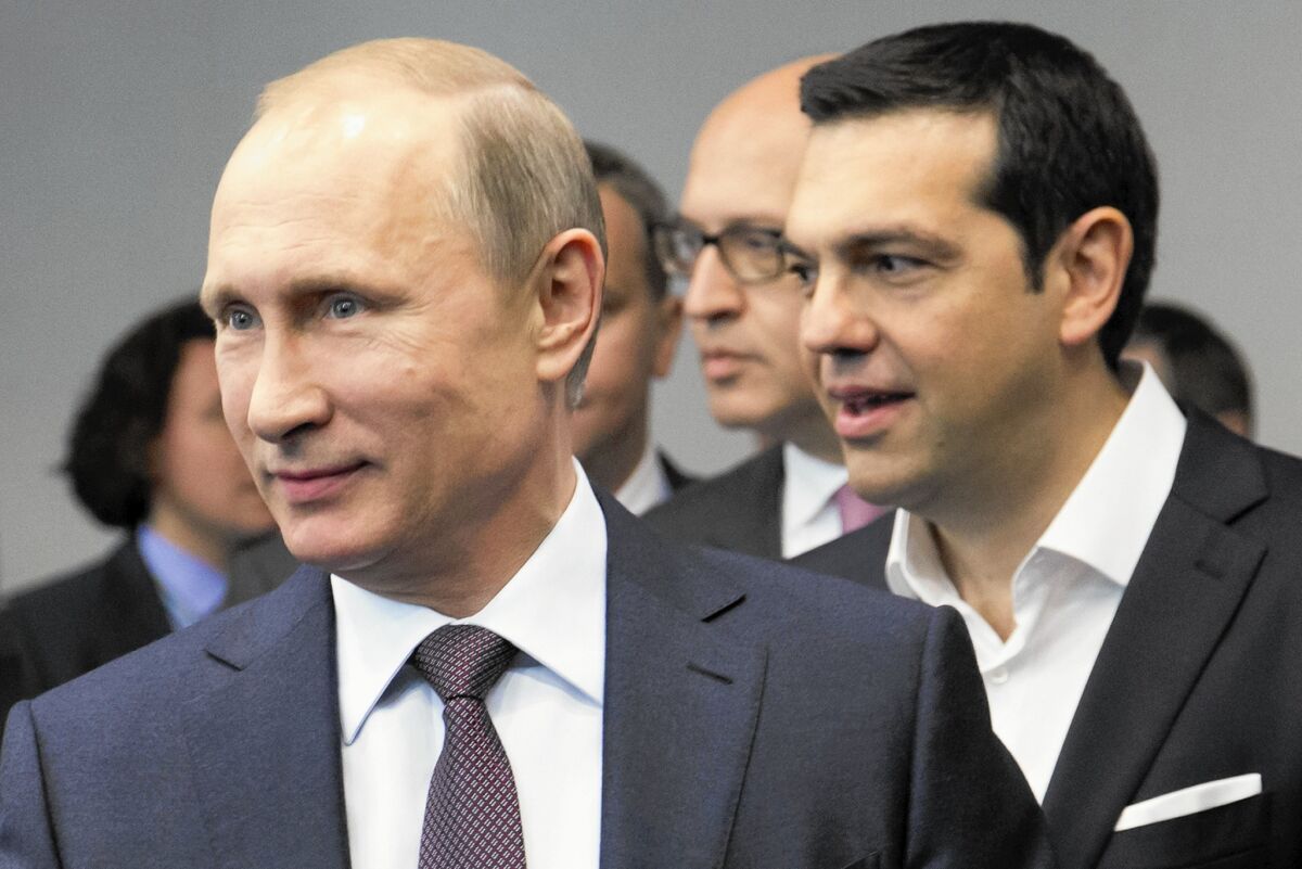 Russian President Vladimir Putin and Greek Prime Minister Alexis Tsipras arrive for talks in St. Petersburg on June 19, 2015.