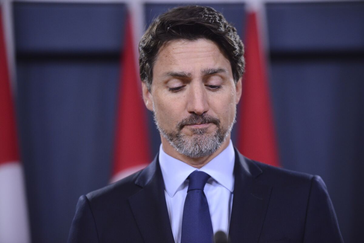 Prime Minister Justin Trudeau holds a news conference in Ottawa on Wednesday, Jan. 8, 2020. (Sean Kilpatrick/The Canadian Press via AP)