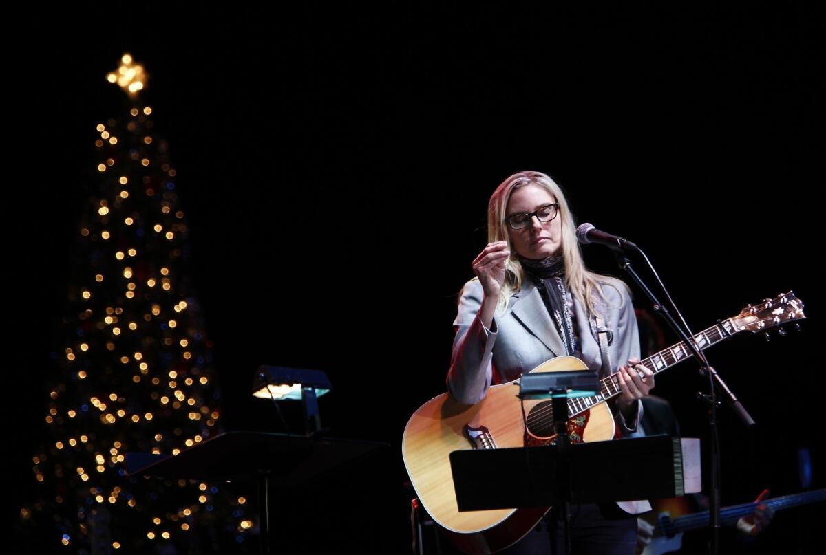 Aimee Mann, shown during her 2011 holiday concert in Los Angeles, sings Jimmy Webb's melancholy "Whatever Happened to Christmas."