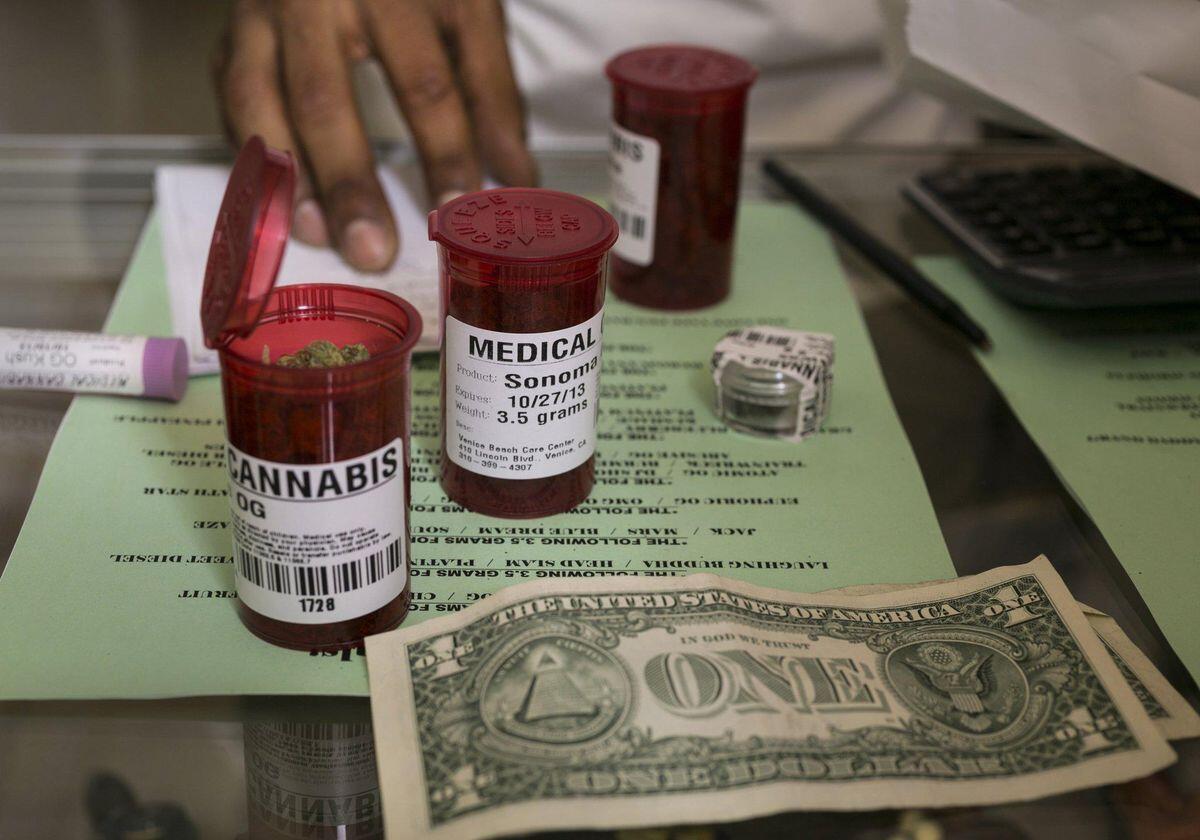 Medical marijuana vials are filled at a dispensary in Venice.