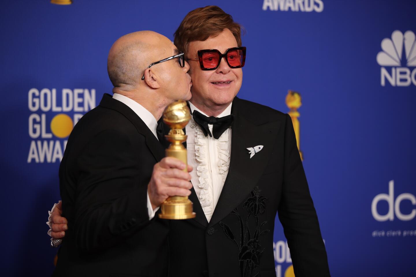 Bernie Taupin and Elton John in the photo deadline room