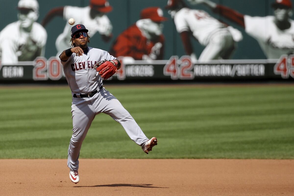 Cleveland Indians shortstop Francisco Lindor (12) makes a play against the St. Louis Cardinals