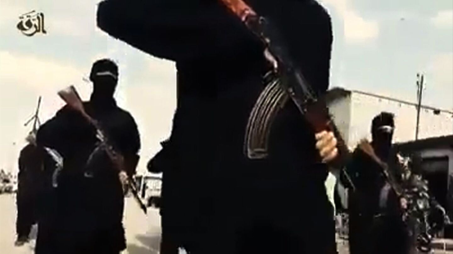 A propaganda video posted on an Islamic State site is said to show recruits marching in an unknown location.
