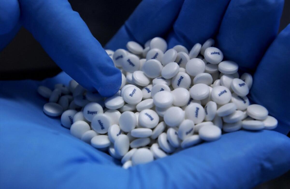 In a new study, people who took aspirin or certain other NSAID painkillers for at least five years were less likely than their peers to be diagnosed with colorectal cancer.