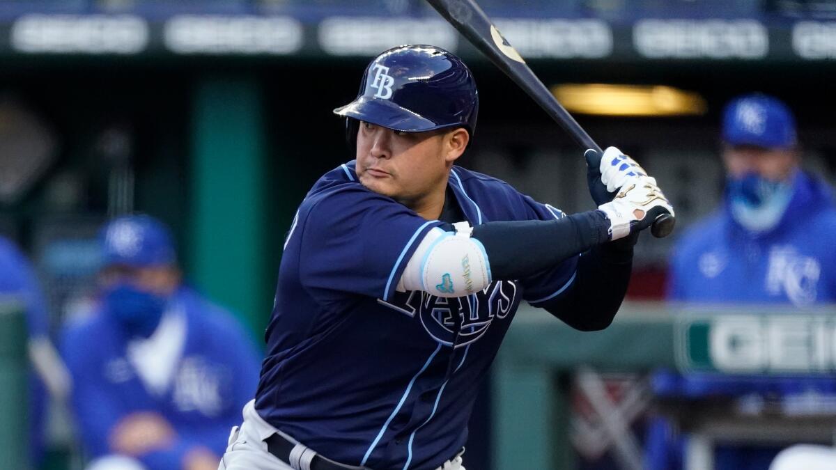 Tampa Bay Rays' Yoshi Tsutsugo bats during the first inning of a baseball game against the Kansas City Royals.