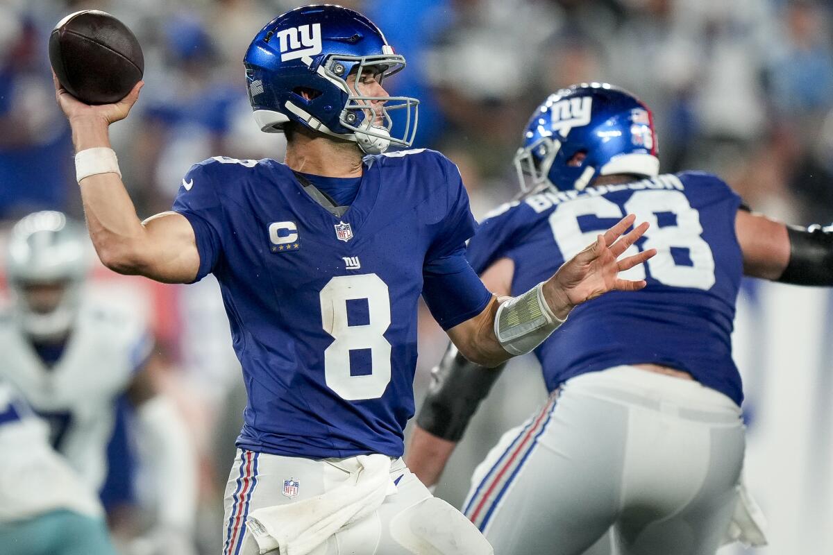 New York Giants quarterback Daniel Jones throws the ball during a game against the Dallas Cowboys.