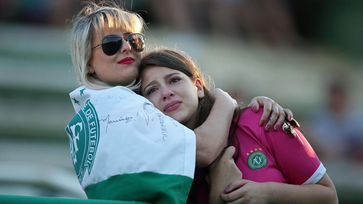 Fans pay tribute to the players of Brazilian team Chapecoense Real who were killed in a plane accident in the Colombian mountains on Nov. 29.