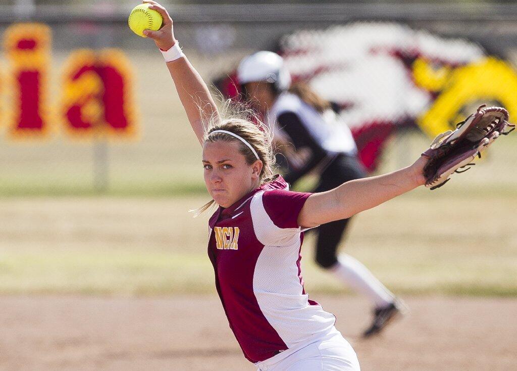 Estancia High's Brittany Walker pitches during an Orange Coast League game against Godinez on Tuesday.