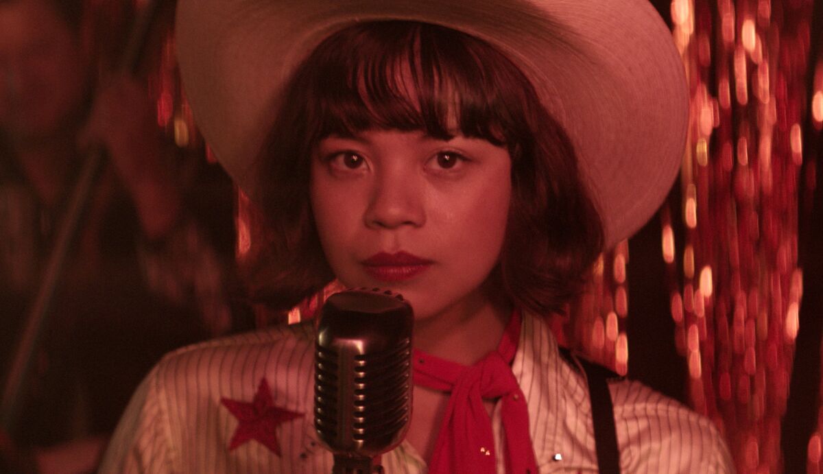 This image released by Sony Pictures shows Eva Noblezada in a scene from "Yellow Rose." (Sony Pictures via AP)