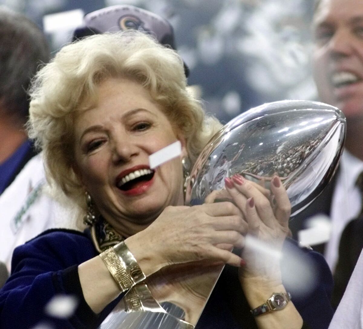 St. Louis Rams owner Georgia Frontiere hugs the Super Bowl trophy after the Rams beat the Tennessee Titans 23–16 in Atlanta on Jan. 30, 2000.