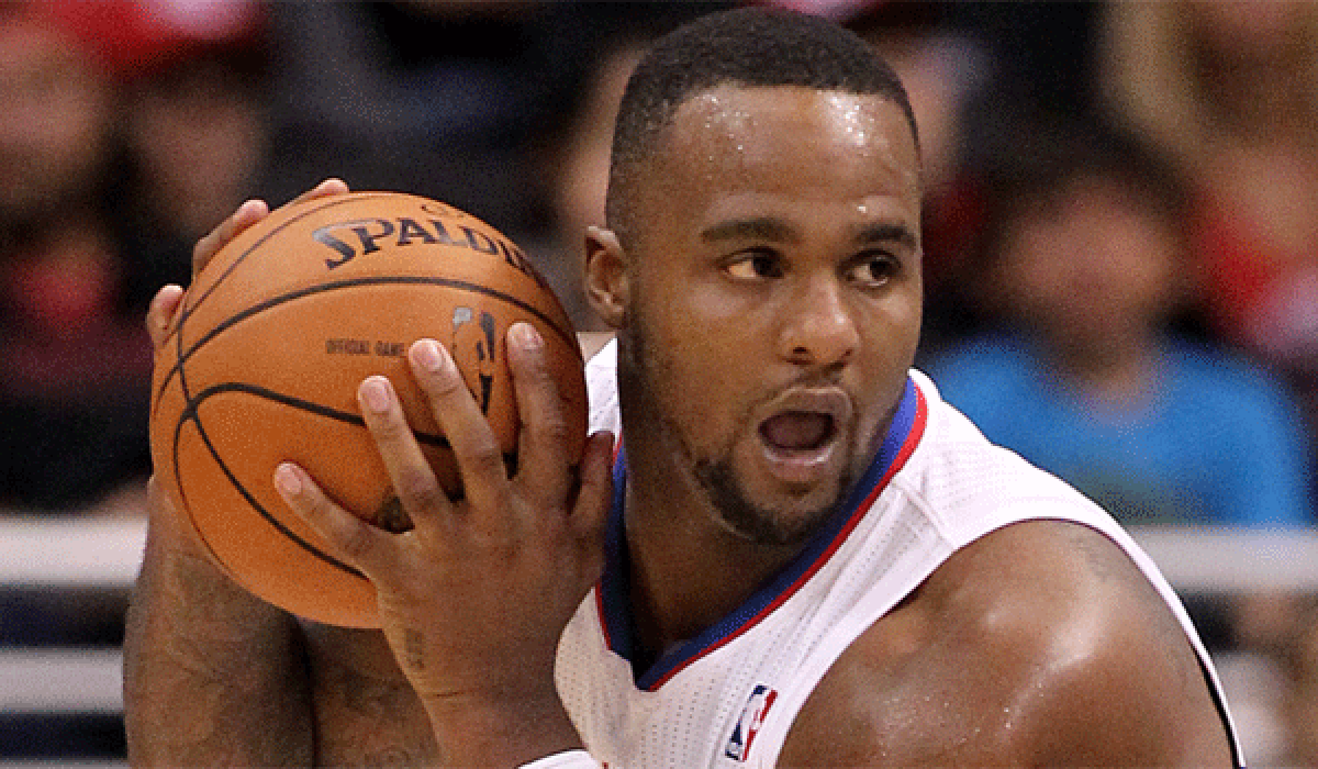 Glen Davis, shown with the Clippers earlier this month, was benched then sent to the locker room by Coach Doc Rivers during Saturday's game in Houston.