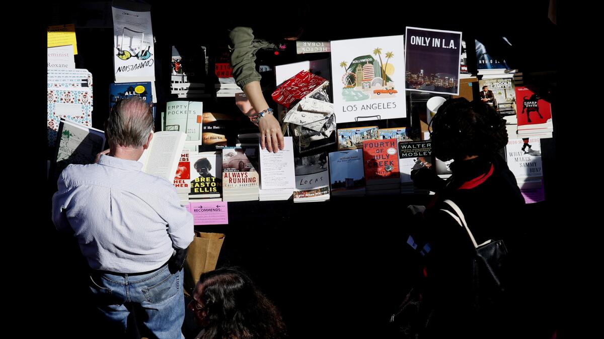People browse books for sale at the Los Angeles Times Festival of Books at USC.