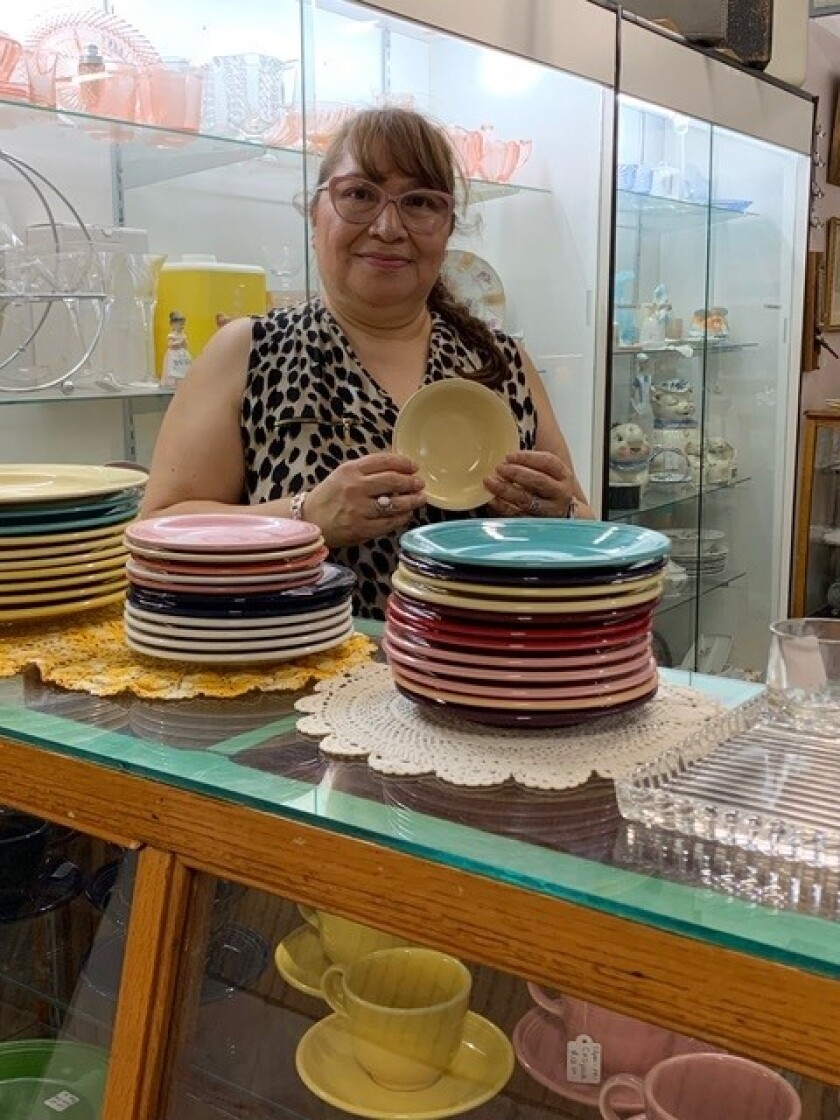 Small colorful pottery and dishes sell well, according to Laura Lyman, co-owner of Ramona Antique Fair.