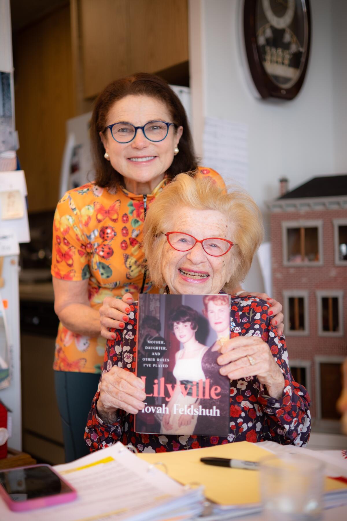 Tovah Feldshuh and Ruth K. Westheimer, who is holding a copy of Feldshuh's new book, "Lilyville."