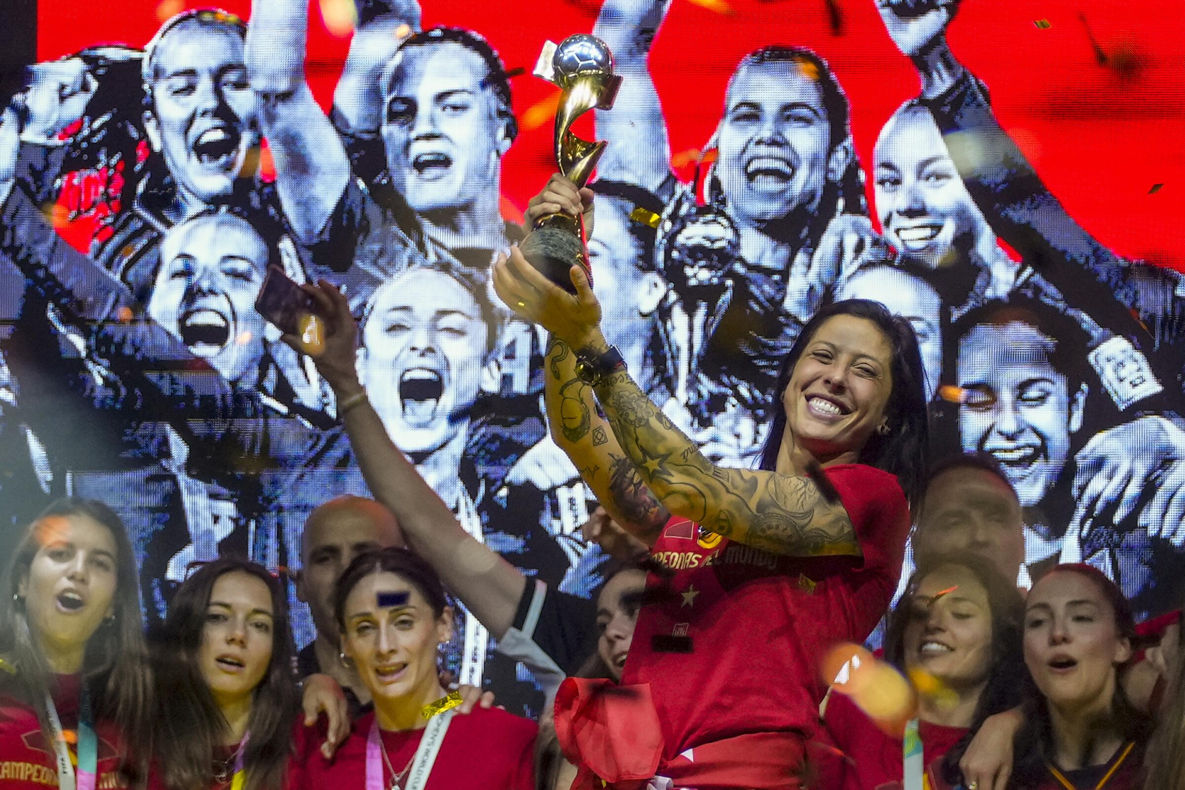 Spain's Jenni Hermoso celebrates with teammates in Madrid after the team's World Cup win in August.