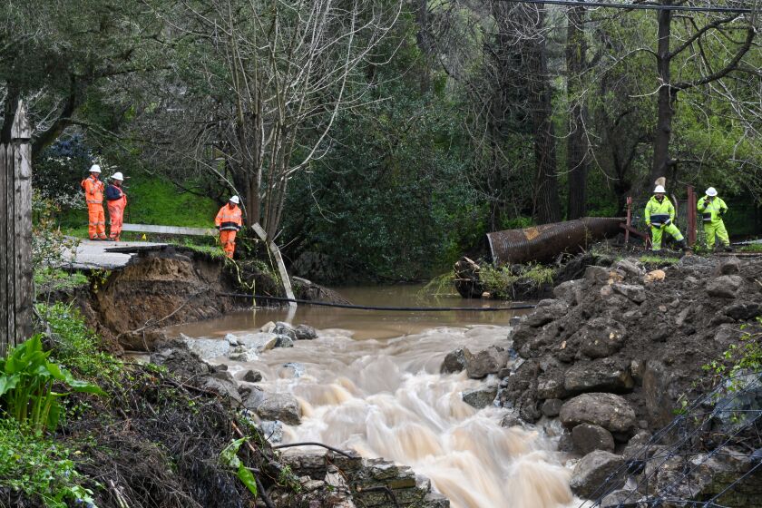 SANTA CRUZ, CA - MARCH 10: A road washed away on North Main Street of Santa Cruz during atmospheric river in California, United States on March 10, 2023. (Photo by Tayfun Coskun/Anadolu Agency via Getty Images)