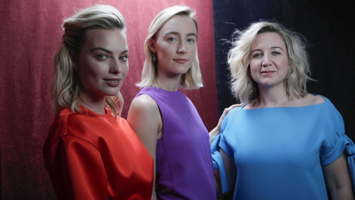 Margot Robbie, from left, plays a cautious Elizabeth while Saoirse Ronan is the titular willful royal in Josie Rourke's film directing debut, "Mary Queen of Scots."