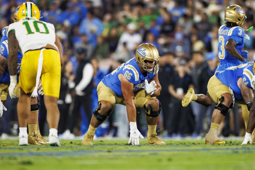 UCLA offensive lineman Niki Prongos sets set at the line of scrimmage during a game against Oregon on Sept. 28.