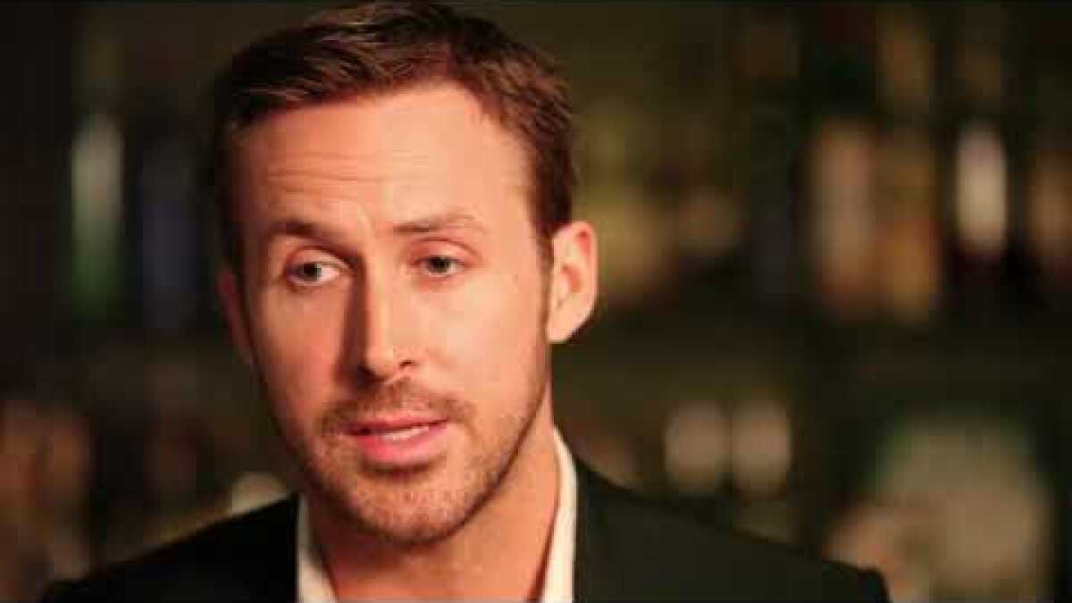 Ryan Gosling looks a little roughed up and really hot on the set