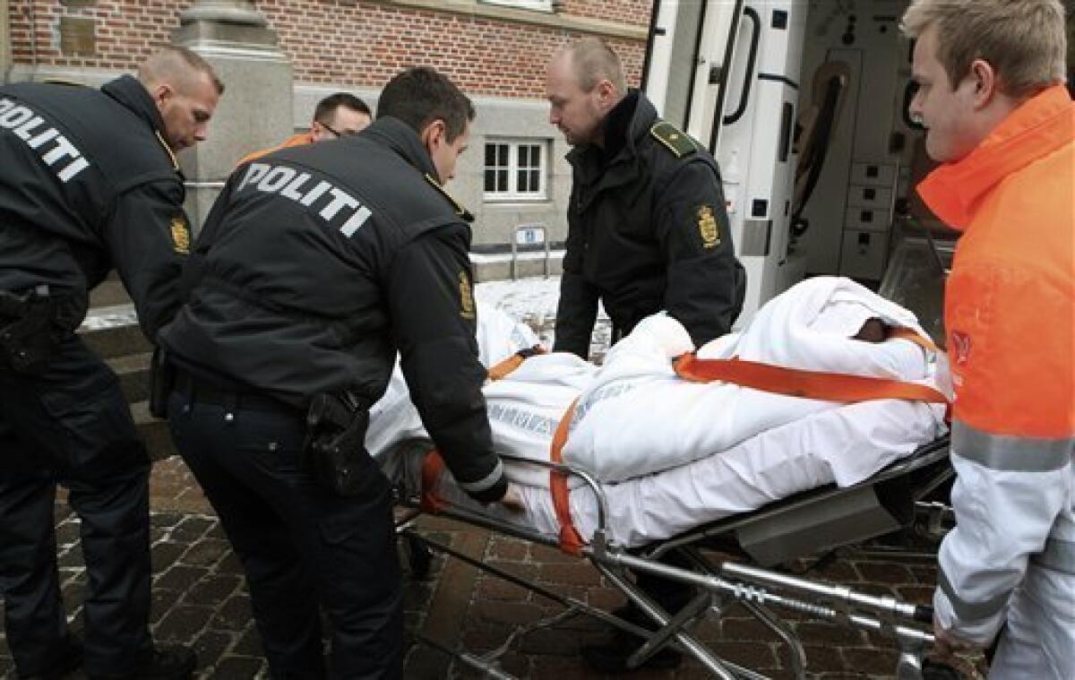 A man charged with the attempted murder of Danish cartoonist Kurt Westergaard is carried into court on a stretcher in Aarhus, Denmark, Saturday, Jan. 2, 2010. Police shot a Somali man wielding an ax and a knife after he broke into the home of an artist whose cartoon of the Prophet Muhammad with a bomb-shaped turban outraged the Muslim world, the head of Denmark's intelligence agency said Saturday. (AP Photo/Polfoto, Ernst van Norde) DENMARK OUT