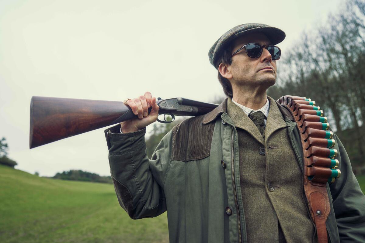 A man out for a hunt on his English country estate