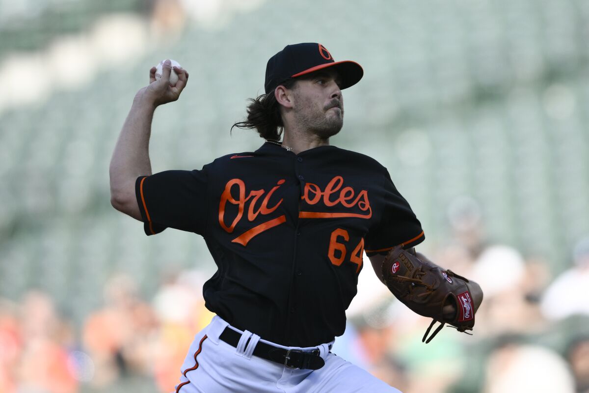 Baltimore Orioles starting pitcher Dean Kremer throws during the first inning of the team's baseball game against the Tampa Bay Rays, Friday, June 17, 2022, in Baltimore. (AP Photo/Nick Wass)