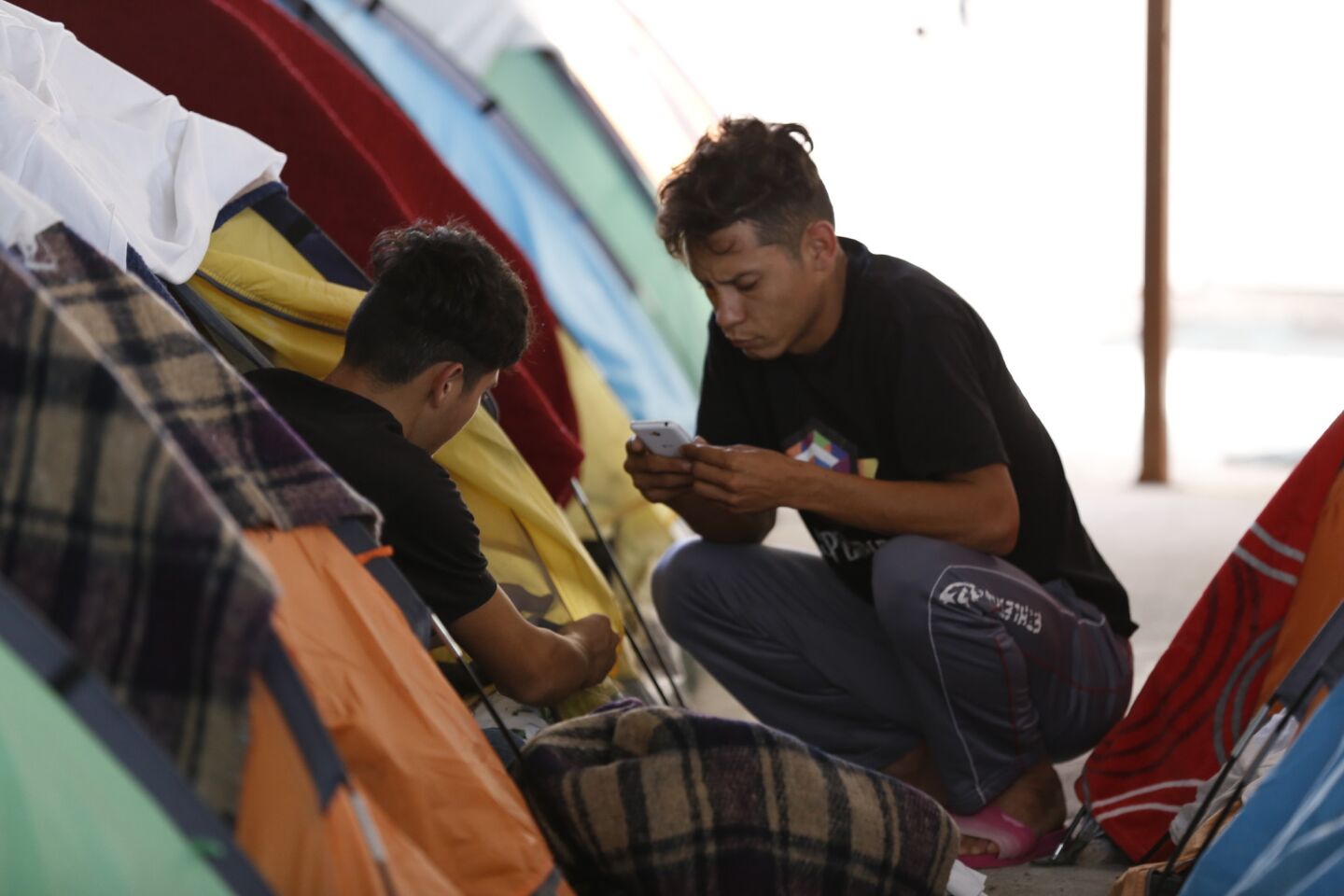 Asylum seekers from Mexico and Central America arrive in Tijuana