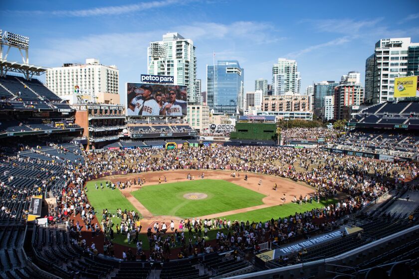 San Diego, CA - February 04: Fans wander the diamond during the Padres' 2023 FanFest at Petco Park on Saturday, Feb. 4, 2023 in San Diego, CA. (Meg McLaughlin / The San Diego Union-Tribune)