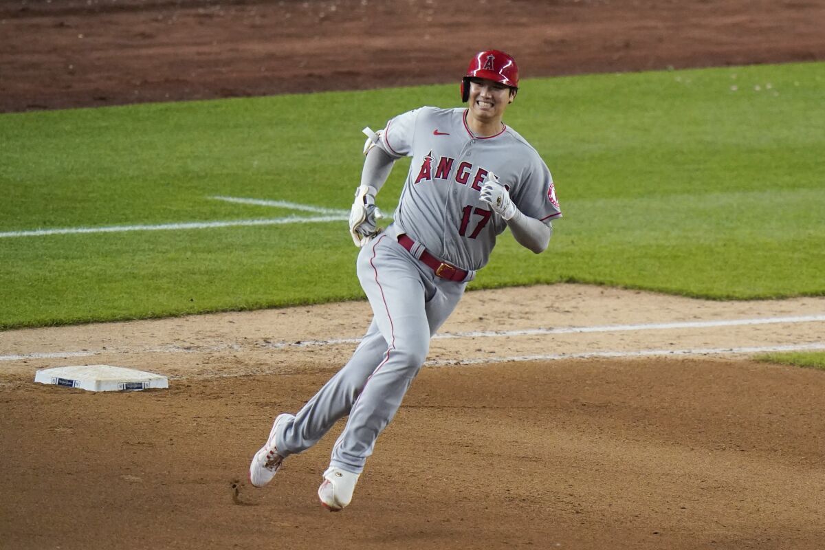 Shohei Ohtani reacts after flying out during the seventh inning against the New York Yankees on Tuesday.