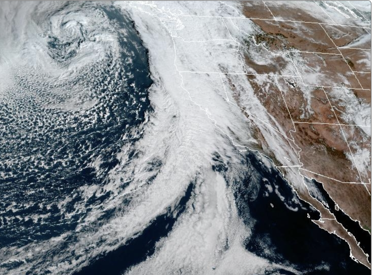 A photo from NOAA's GOES-West satellite showed the 'Pineapple Express' arriving to the West Coast on Wendesday morning