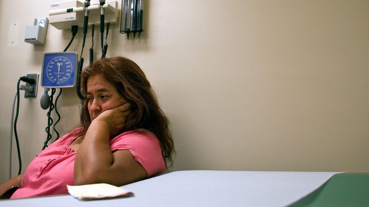 A patient waits in an examining room to see a doctor for her issues with depression and anxiety. Depression is more common among transgender than cisgender adults, a study finds. (Gina Ferazzi / Los Angeles Times)