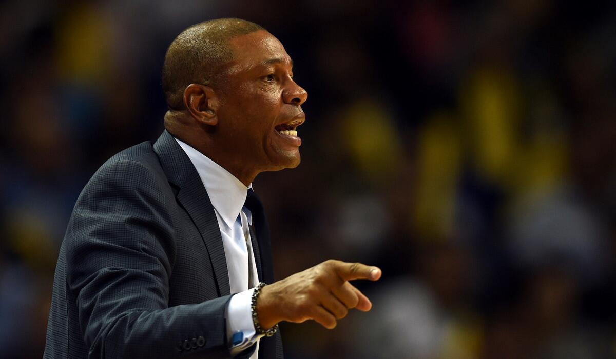 Clippers Coach Doc Rivers talks to his team during the 2015 NBA Global Games China pre-season basketball match against the Charlotte Hornets on Oct. 14.