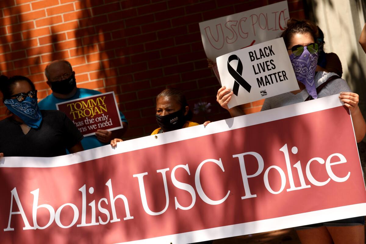 Protesters demonstrate in front of the USC Department of Public Safety to abolish the campus police force 