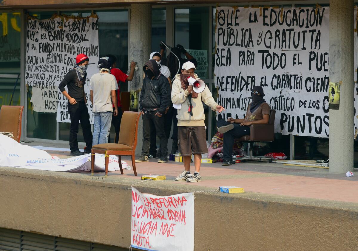 Students protest at the National Autonomous University of Mexico's rectory building in Mexico City.