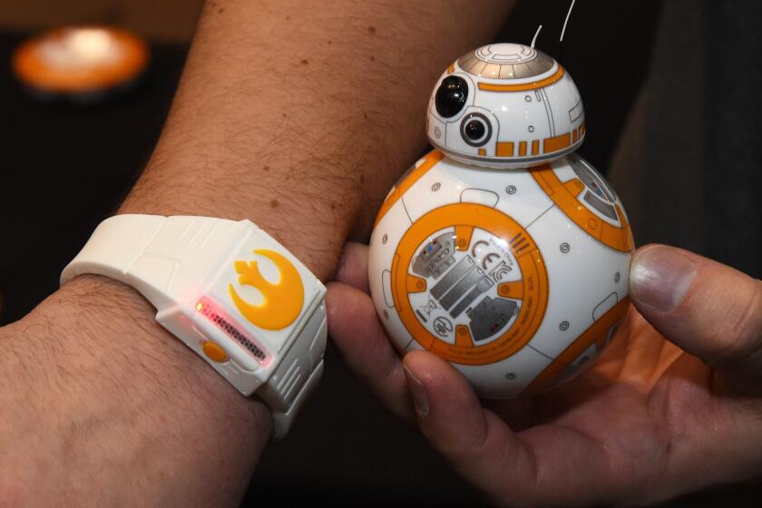 Sphero's BB-8 technical prototype robot and Force Band are displayed at the 2016 Consumer Electronics Show in Las Vegas.