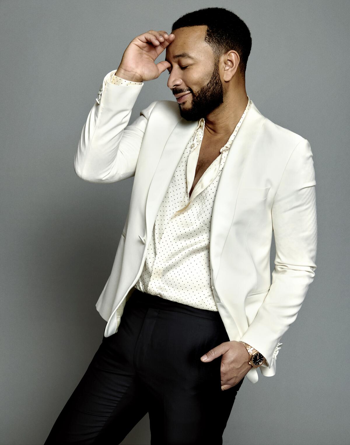 "I'm a singer who also plays piano," says 12-time Grammy Award-winner John Legend.