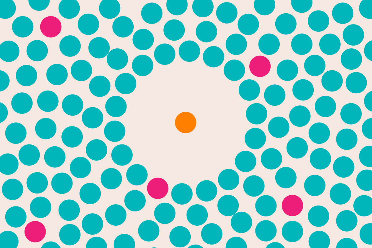 illustration of one isolated orange circle surrounded by many other blue circles and a few pink circles.