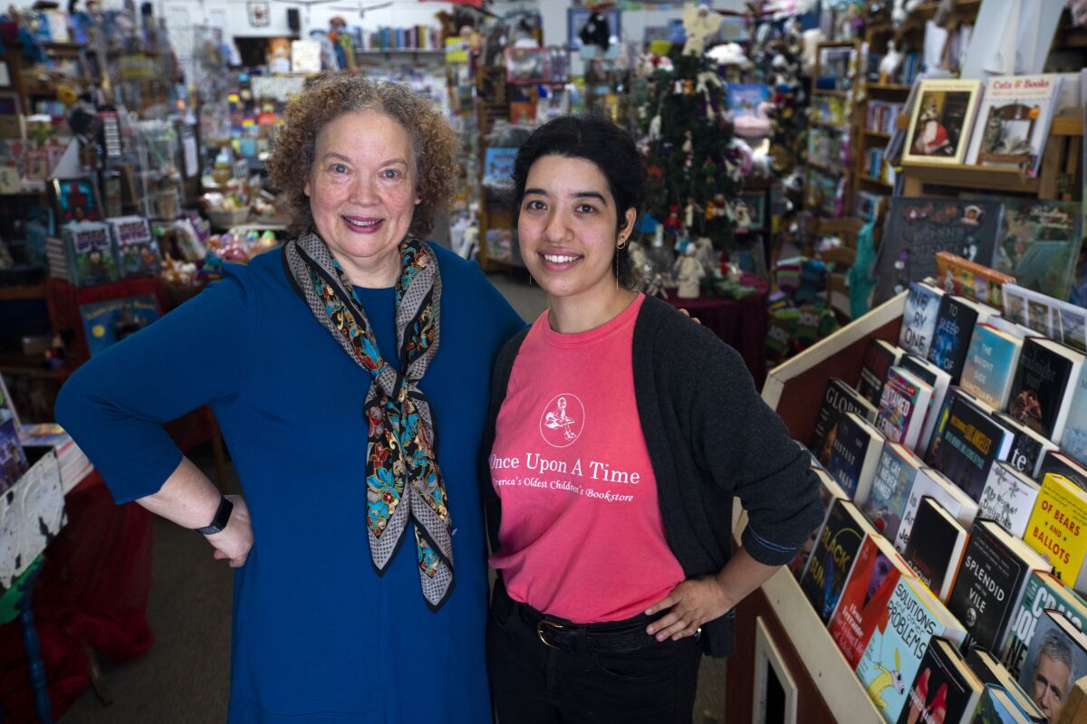 Maureen Palacios at Once Upon a Time Bookstore in Montrose with her daughter Jessica Palacios.