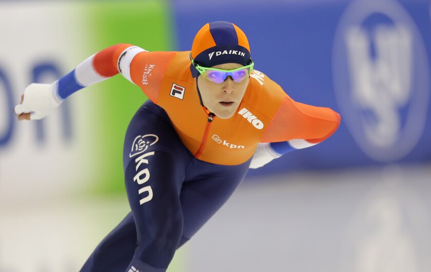 FILE - The Netherlands' Jorien Ter Mors competes during the women's 1500 meters race of the speed skating World Cup at the Minsk ice arena in Minsk, Belarus, Saturday, Nov. 16, 2019. Mors has retired from the sport. Ter Mors was the first female athlete to win Olympic medals in two disciplines at the same Winter Games. The 32-year-old speedskater won three long track gold medals and one short track bronze medal while competing at the 2014 and 2018 Olympics. (AP Photo/Sergei Grits, File)