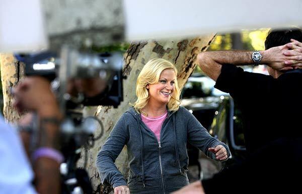 Amy Poehler, pictured here in the "Hunting Trip" episode, stars as the upbeat Leslie Knope, deputy director of parks and recreation in Pawnee, Ind. The NBC sitcom, which premiered amid speculation that it wouldn't last long, has become a critical favorite. RELATED: Critic's Notebook: At play with the department of 'Parks and Recreation'