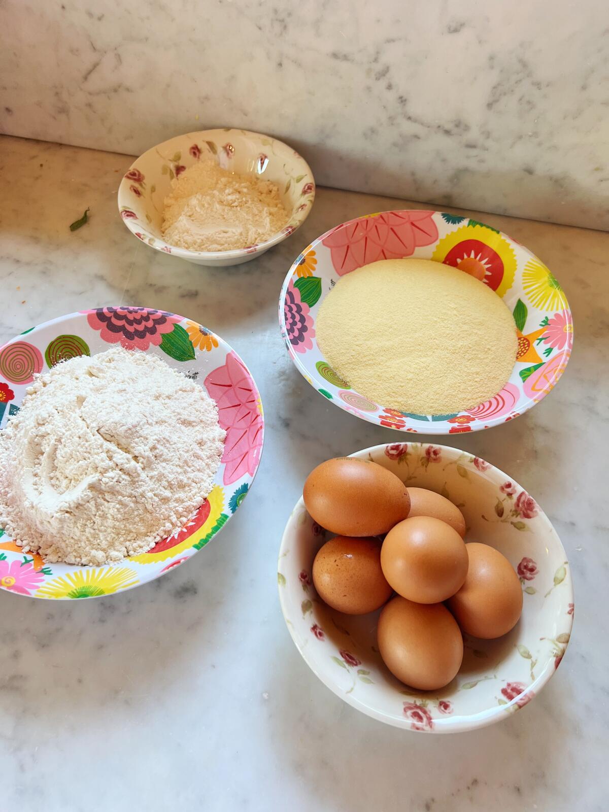 Semolina and type 0 flours and eggs for making fresh pasta. 