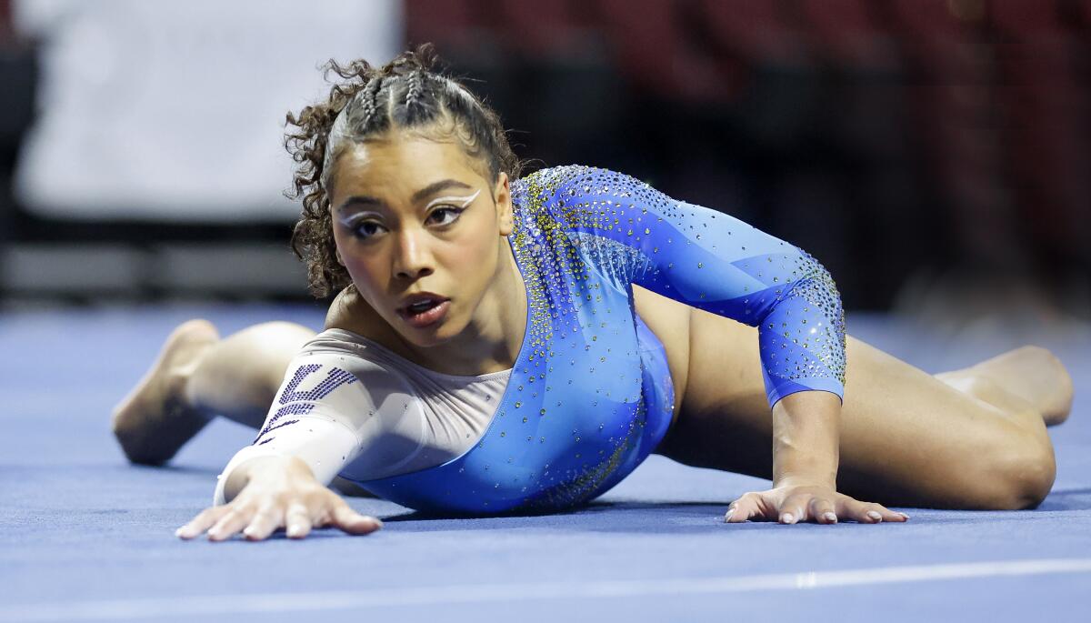 UCLA's Margzetta Frazier competes on the floor exercise during an NCAA gymnastics meet
