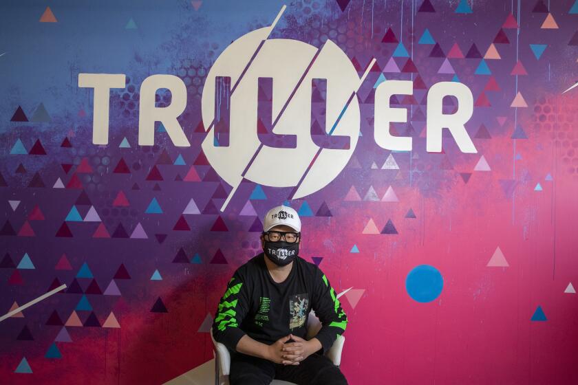 CENTURY CITY, CA - AUGUST 06: Triller CEO Mike Lu sits for a portrait in his officesThursday, Aug. 6, 2020 in Century City, CA. Triller launched a music video editing app in 2015, and has risen to prominence especially as TikTok is in danger of getting banned in the U.S. (Brian van der Brug / Los Angeles Times)