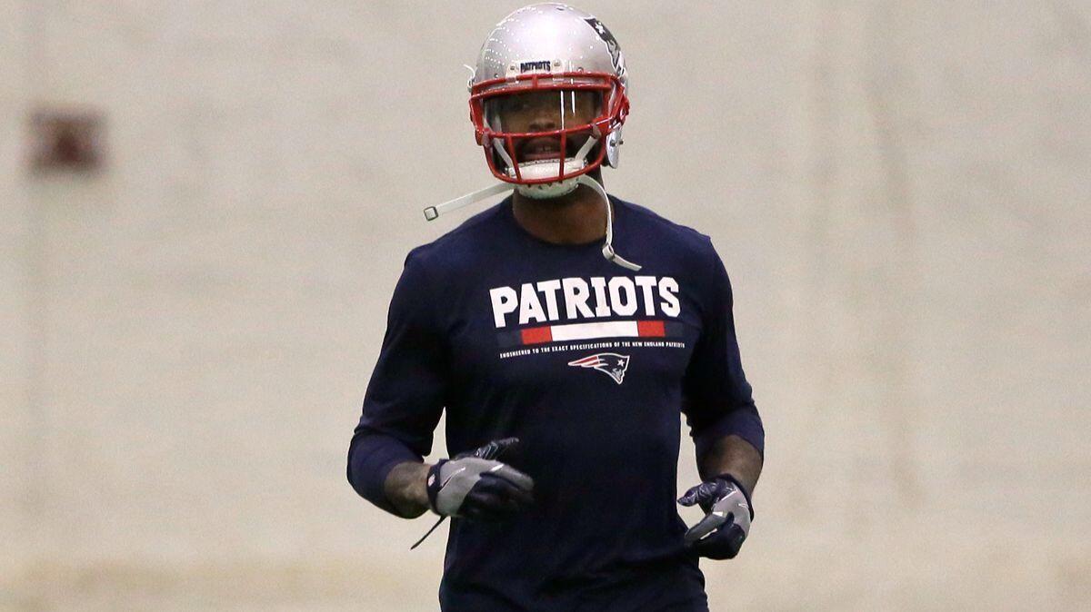 New England Patriots wide receiver Kenny Britt warms up during practice on Wednesday.