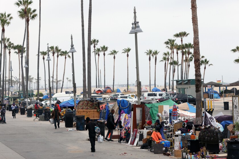 Tents and temporary structures along the Venice Beach boardwalk