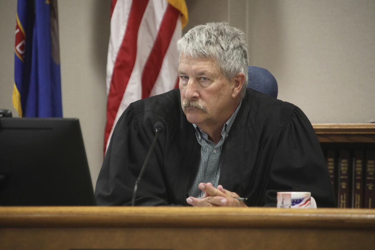 Judge Bruce Romanick listens to arguments in court.