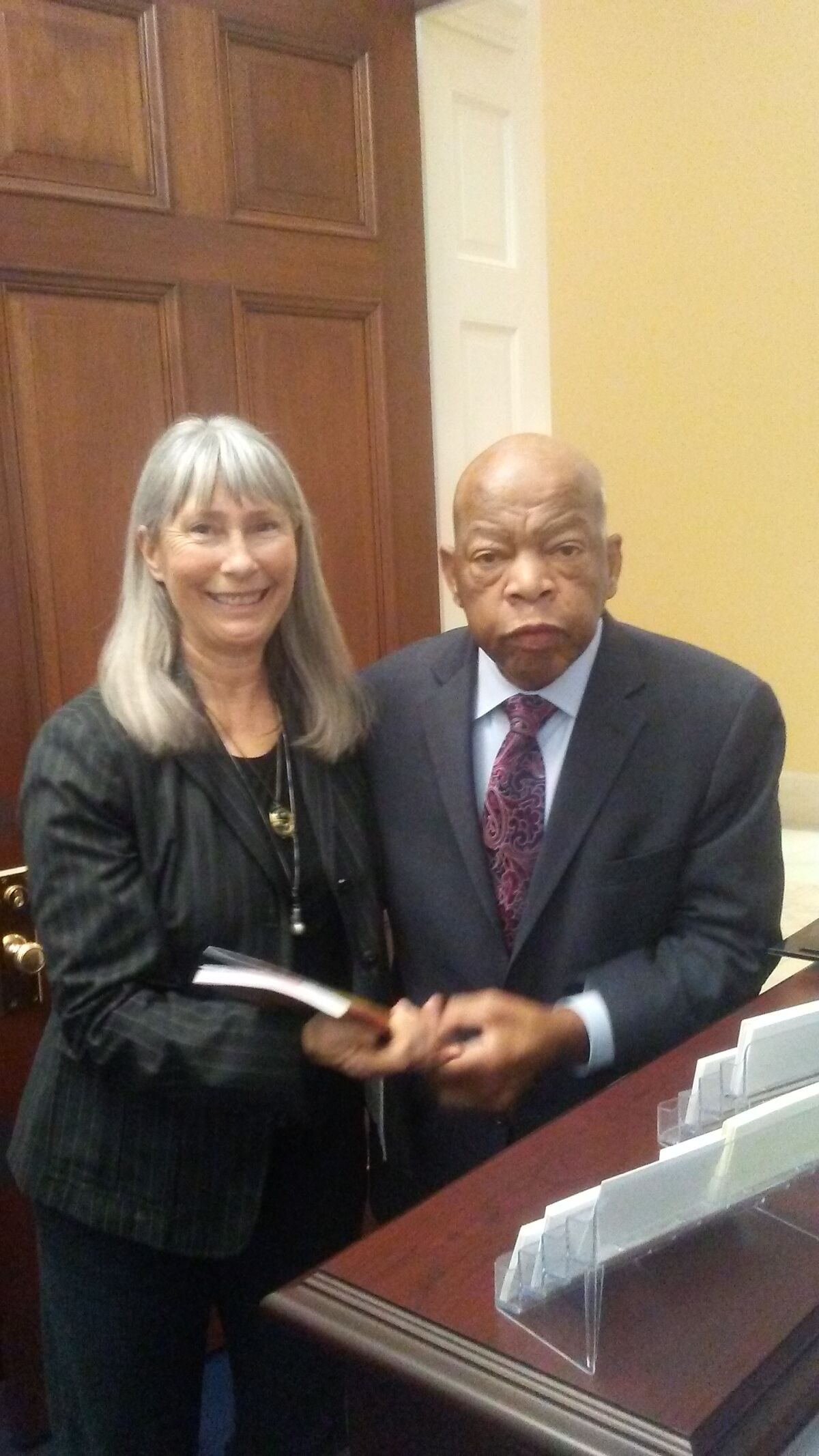 Jo Thompson of Pacific Beach meets Rep. John Lewis (D-Ga.) in January 2019.