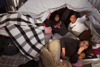The Mendoza family at the Movimento Juventud 2000 shelter in Tijuana.