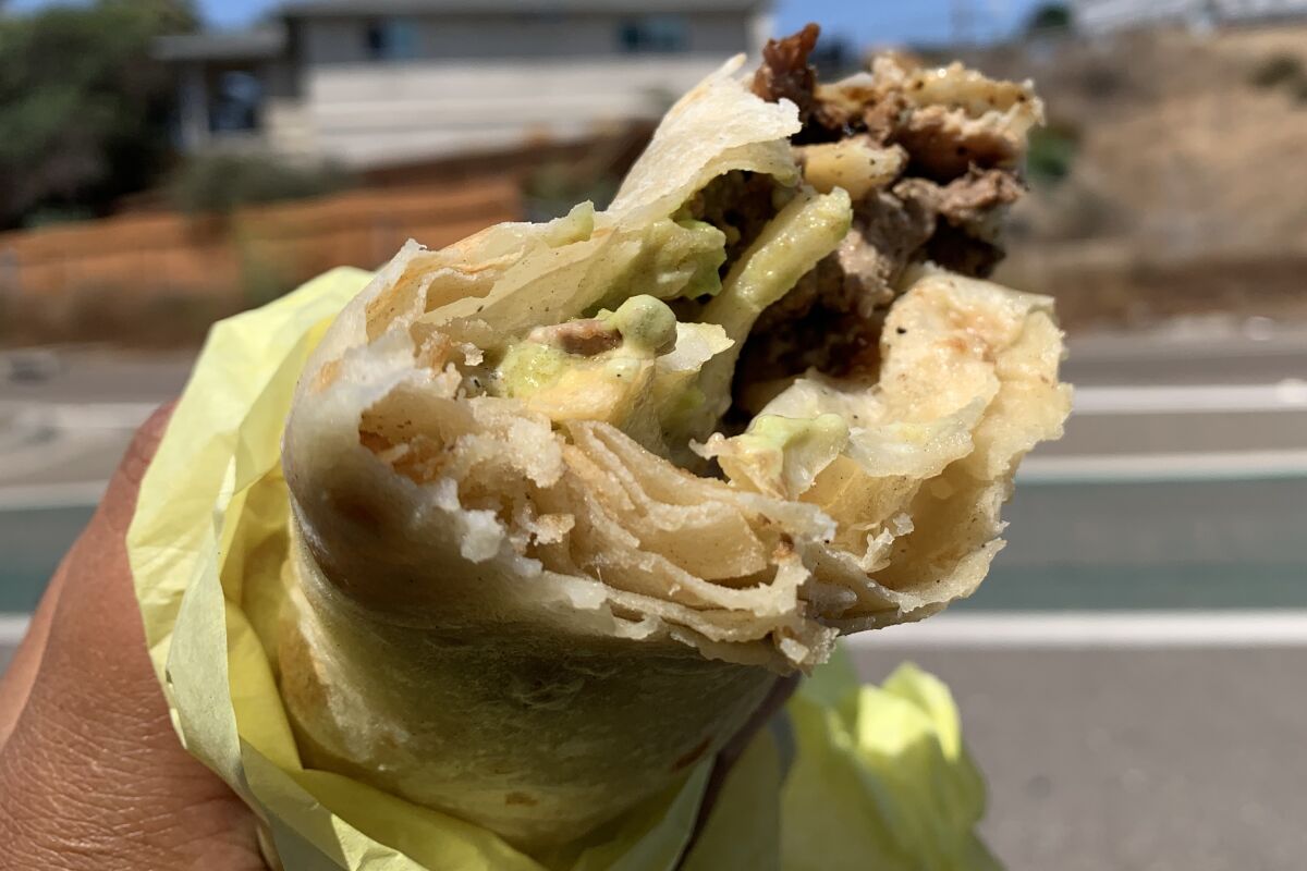 It may be a fan favorite among Point Loma residents, but the Ortiz's burrito was too empty to impress my taste buds.